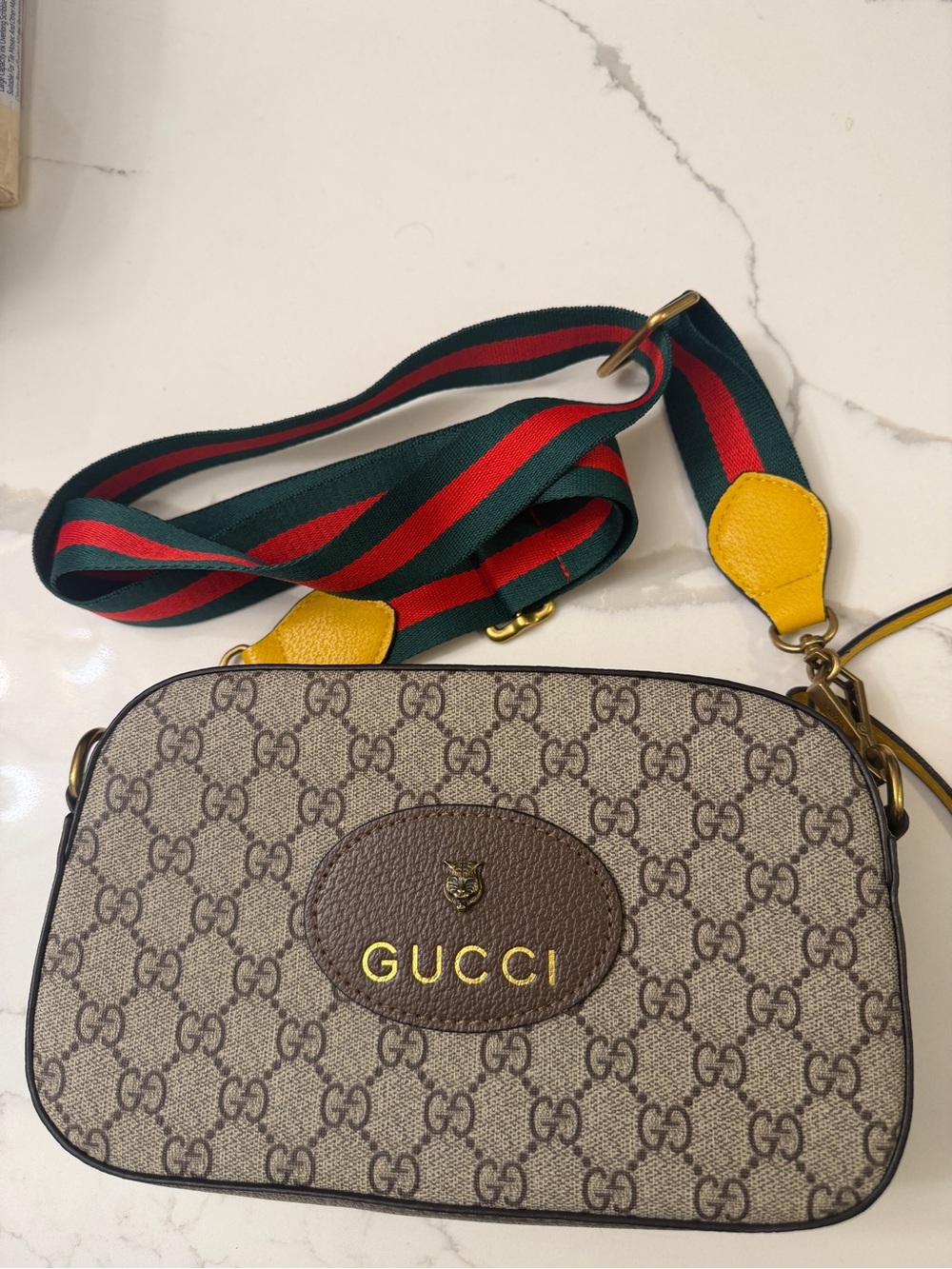 Gucci Beige GG Supreme Crossbody with Green-Red Web and Yellow Trim
